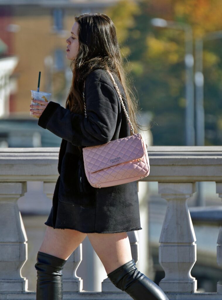 Oversized streetwear look with hoodie relaxed pants and modern sneakers