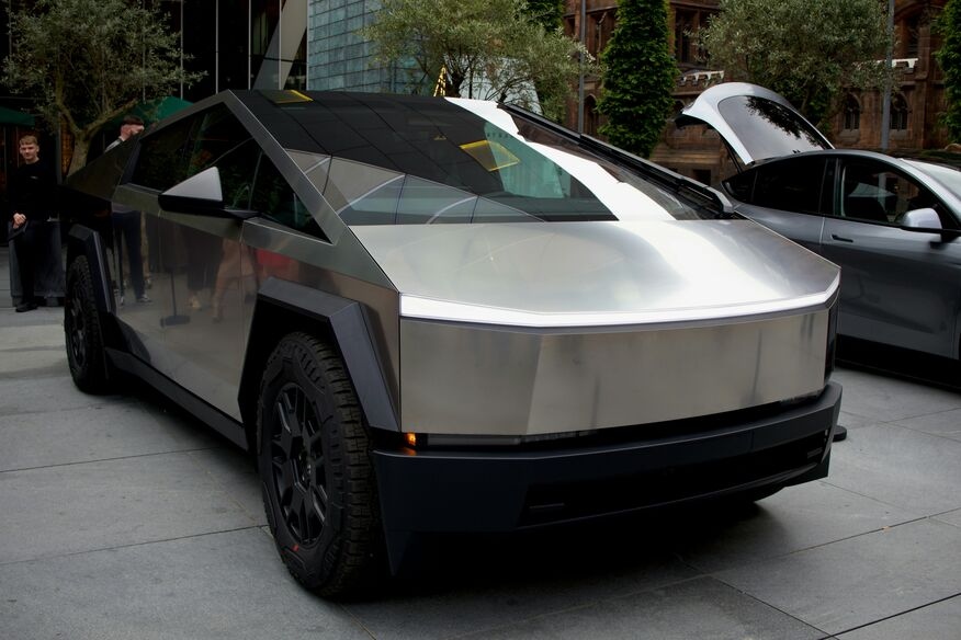 Pentagon electric vehicle strategy featuring Tesla Cybertruck influence on military planning and modern defense technology.