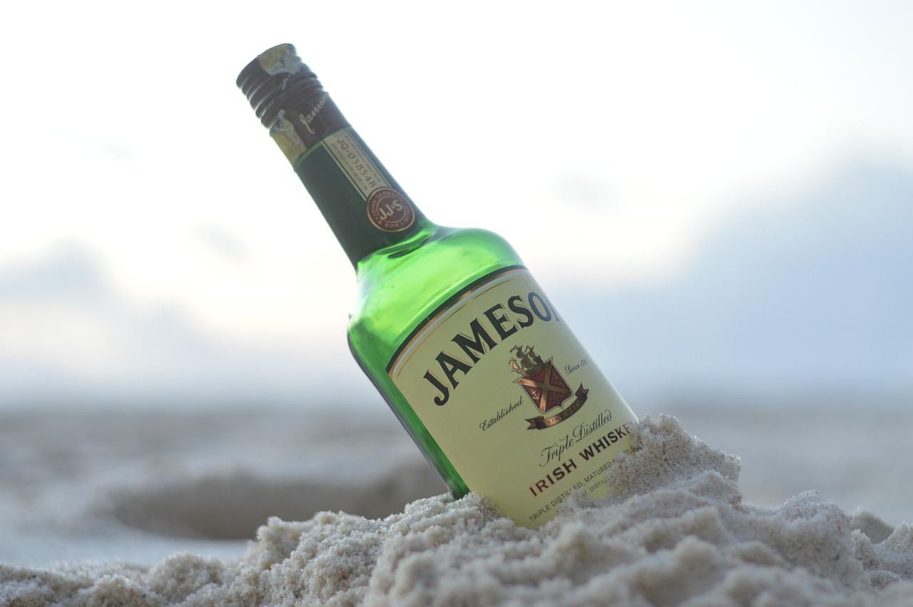 jameson orange old fashioned cocktail served in glass with ice