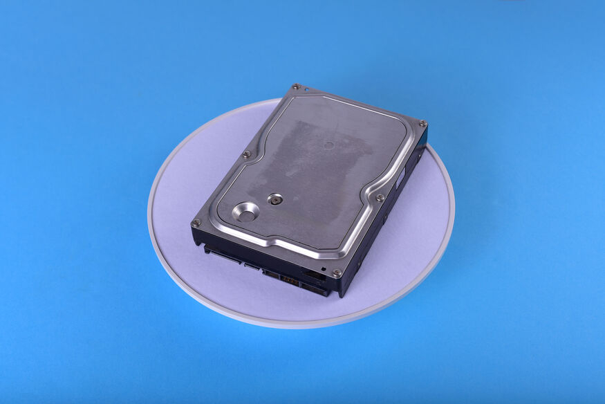 A traditional hard disk drive shown as a reliable storage option for large files, photos, videos, documents, and backup data at a lower price.